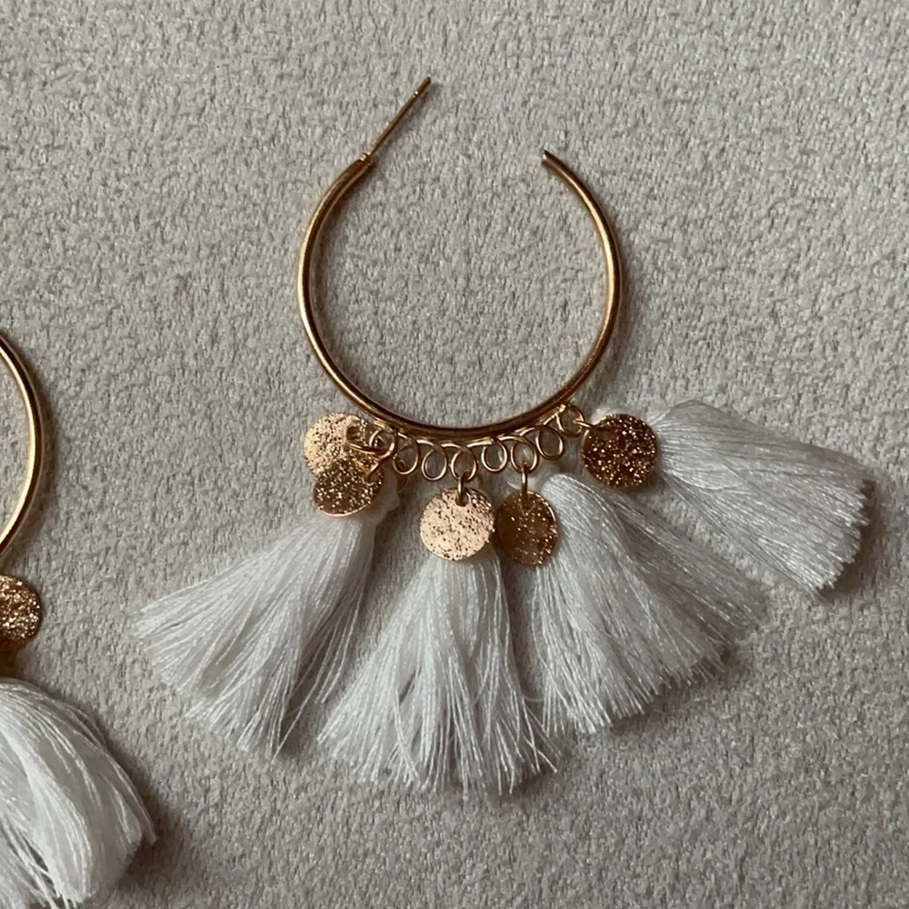 Gold hoop white fan tassel earrings